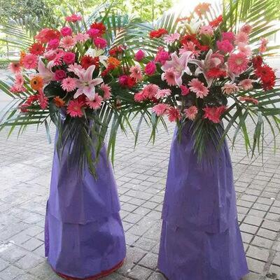 开业花篮系列#紫气东来～～花材:主花～百合,各色非洲菊,配花与配草