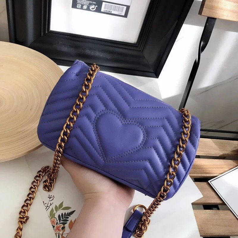 编号9D0138022701130。新出天使双G桃心包包