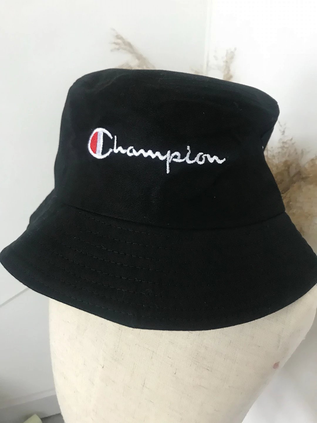 champion渔夫帽男女情侣盆帽日系经典草写街头刺绣复古两色 黑/白