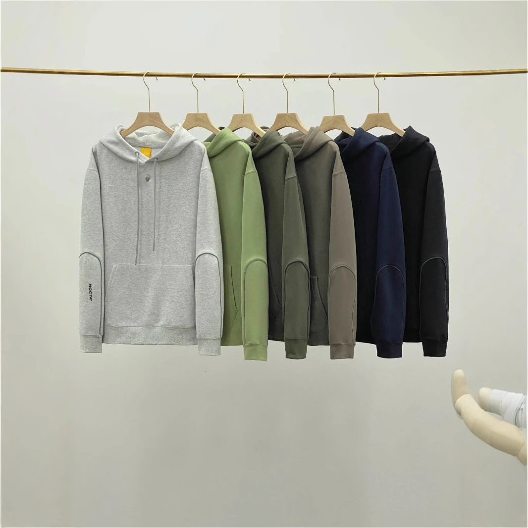 NOCTA Hoodie and Jogger Set with Reflective Piping