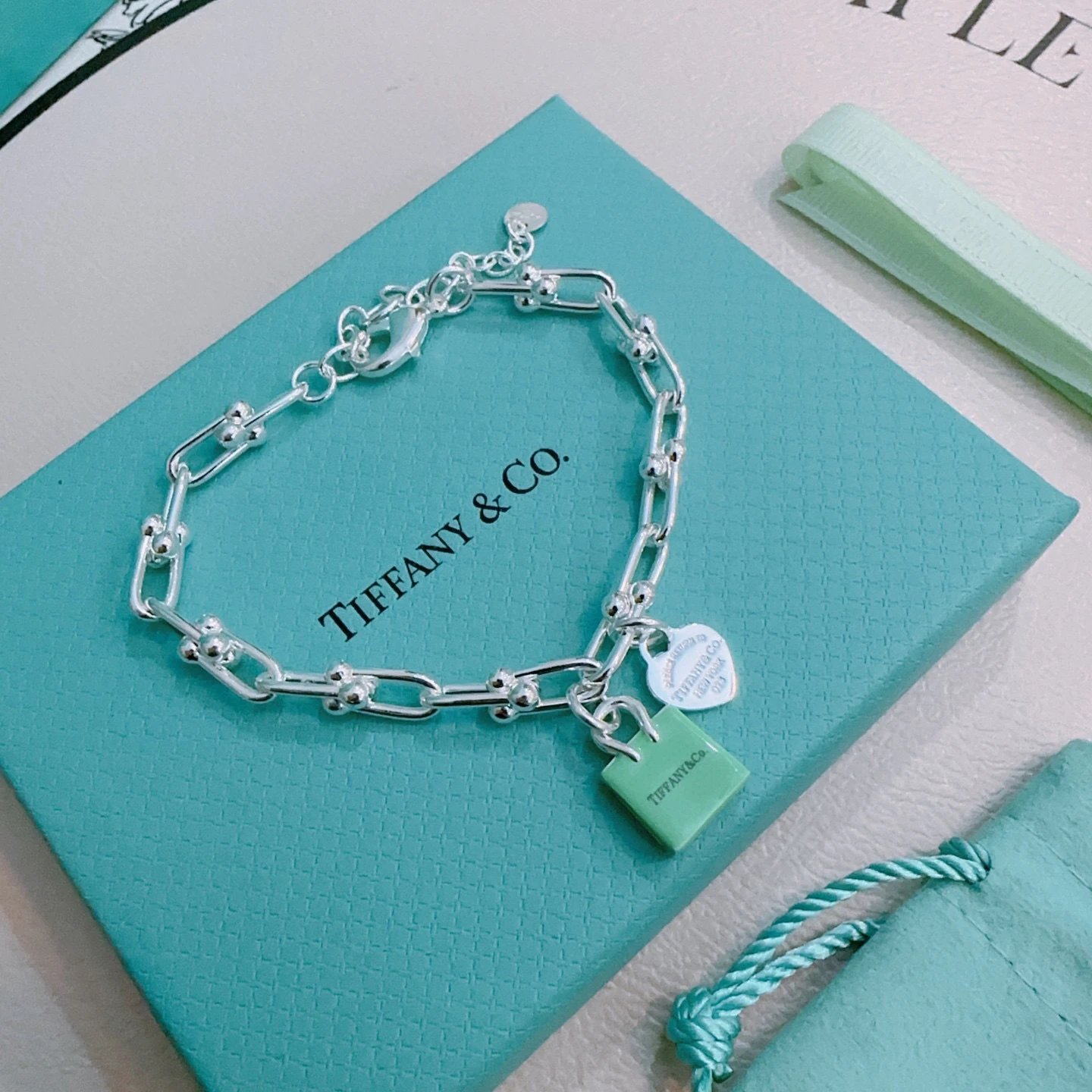 Tiffany & Co. Silver Heart Green Lock Bracelet