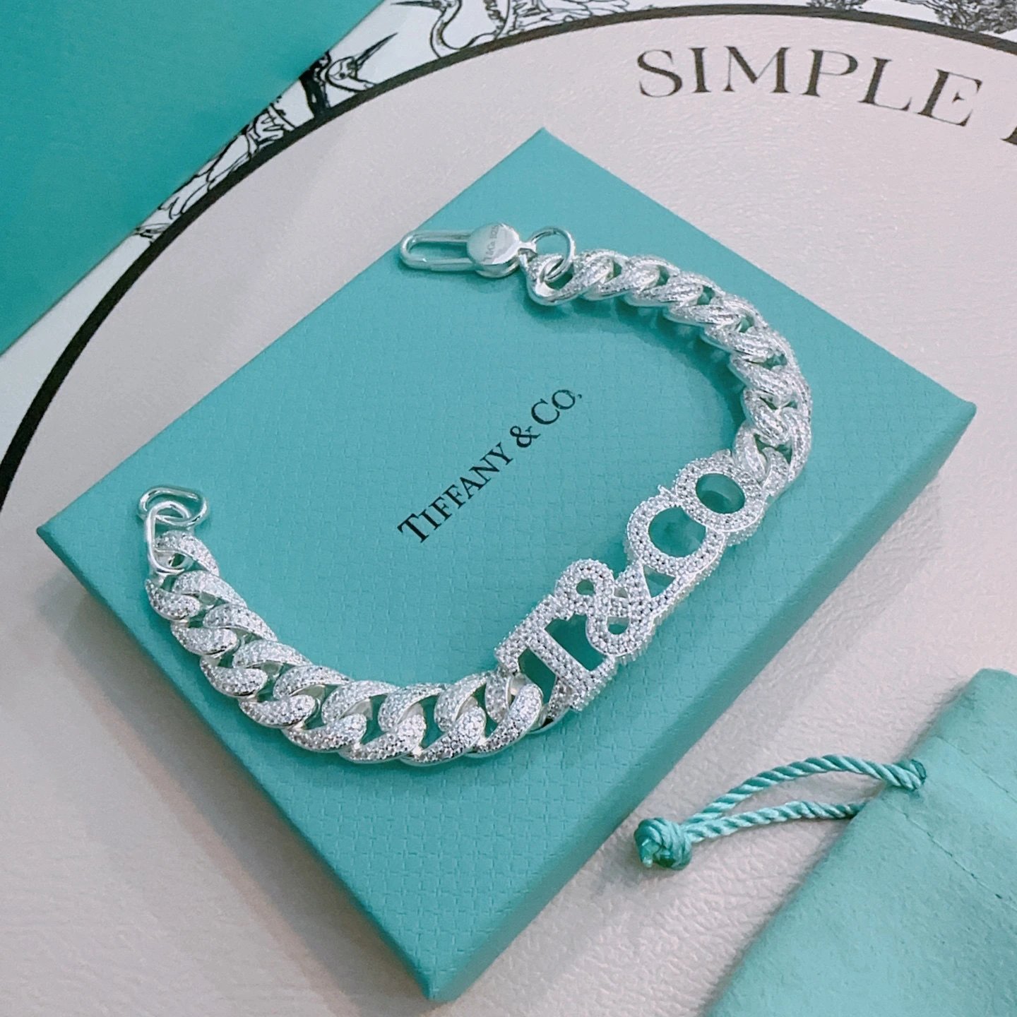 Tiffany & Co Silver Cuban Link Crystal Logo Bracelet