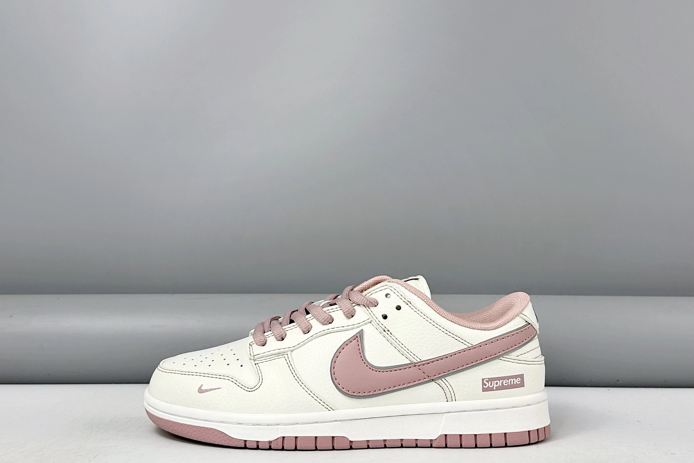 Nike Supreme Pink White Low‑Top Leather Sneakers