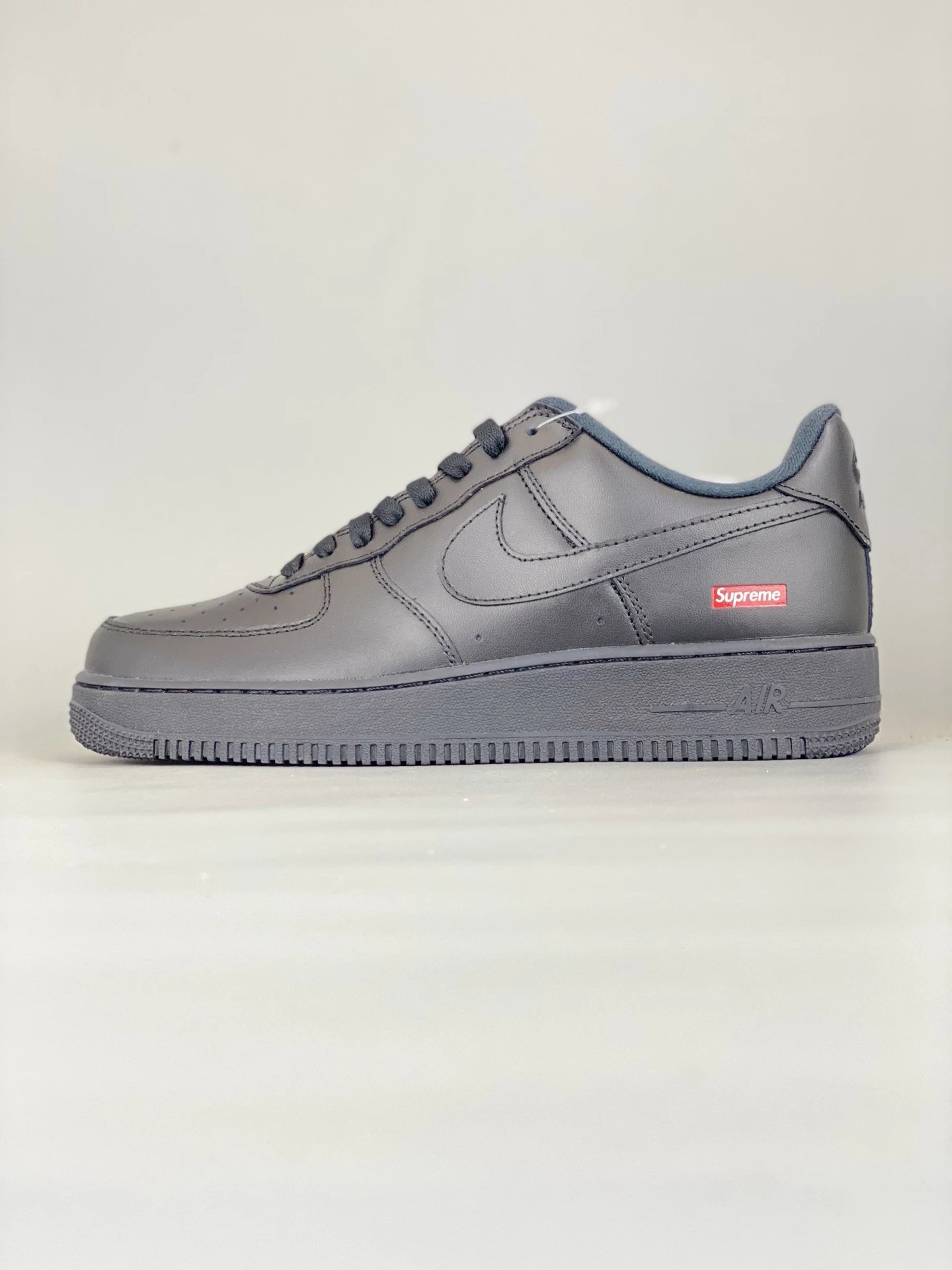 Nike Supreme Air Force 1 Black Leather Sneakers