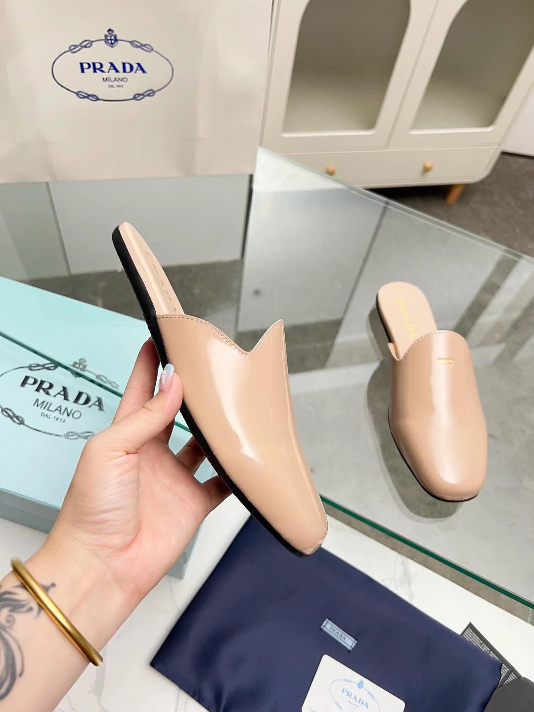 Prada Milano Beige Patent Leather Women’s Mules
