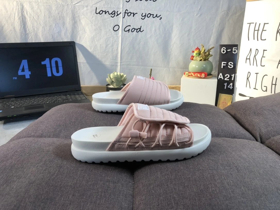 Nike Women’s Soft Pink Quilted Slide Sandals