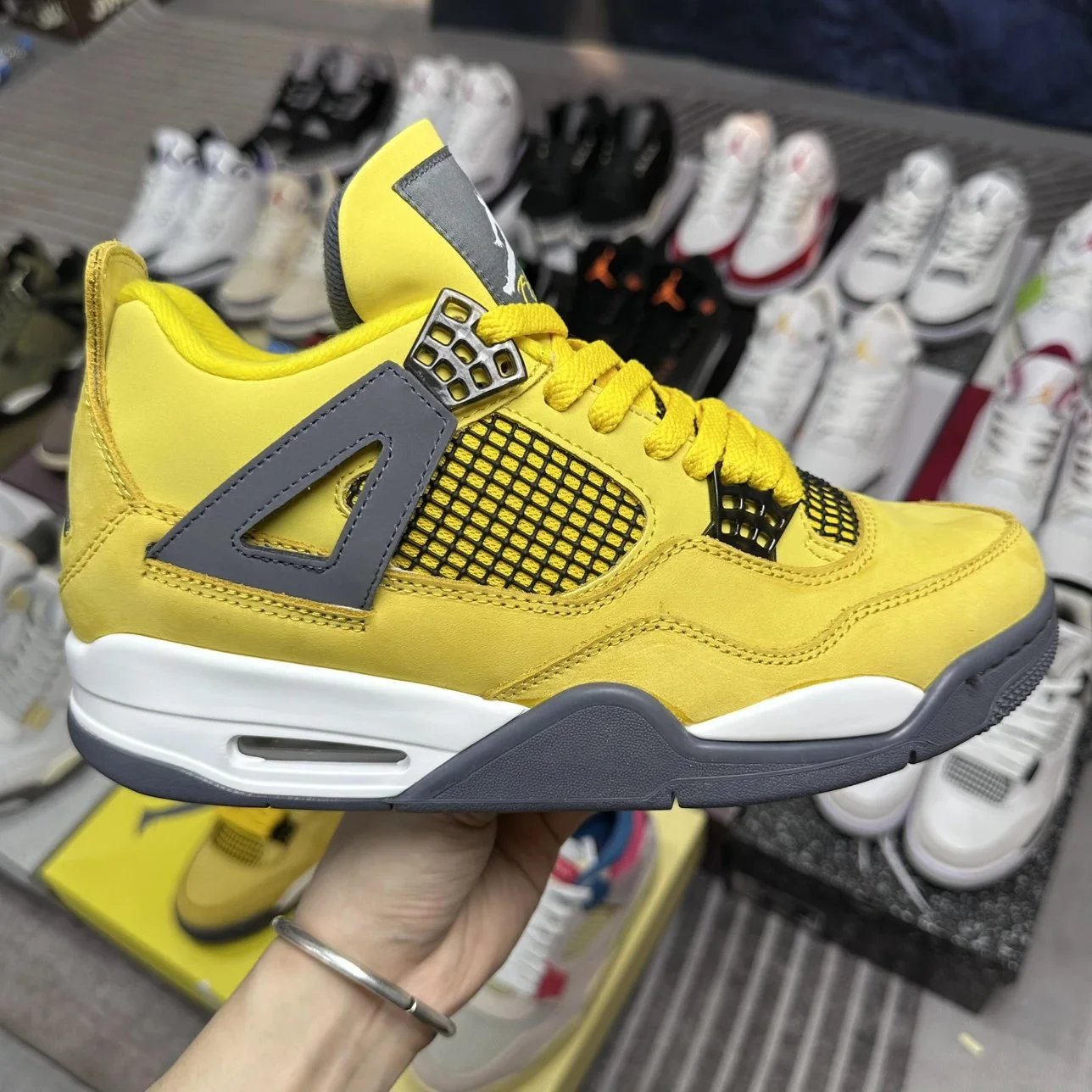 Air Jordan 4 Lightning Sneakers