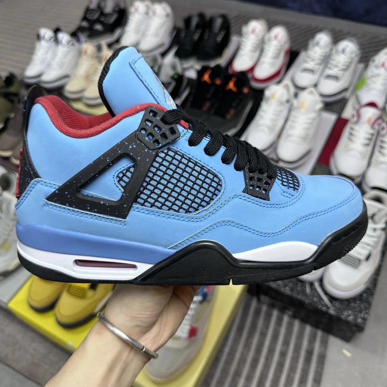 Air Jordan 4 Blue Suede Sneakers