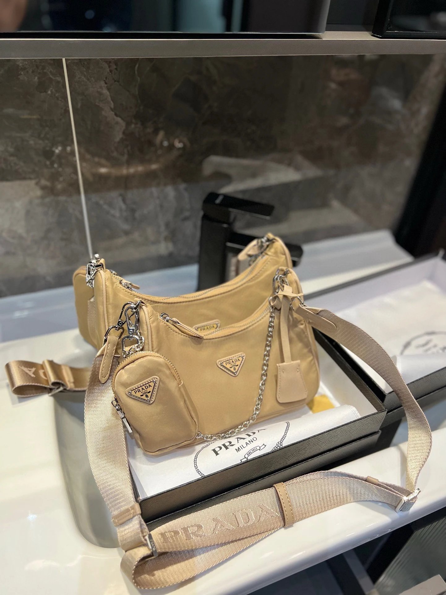 Prada Shoulder Bags Nylon bag with triangle logo plaque and chain strap — 25