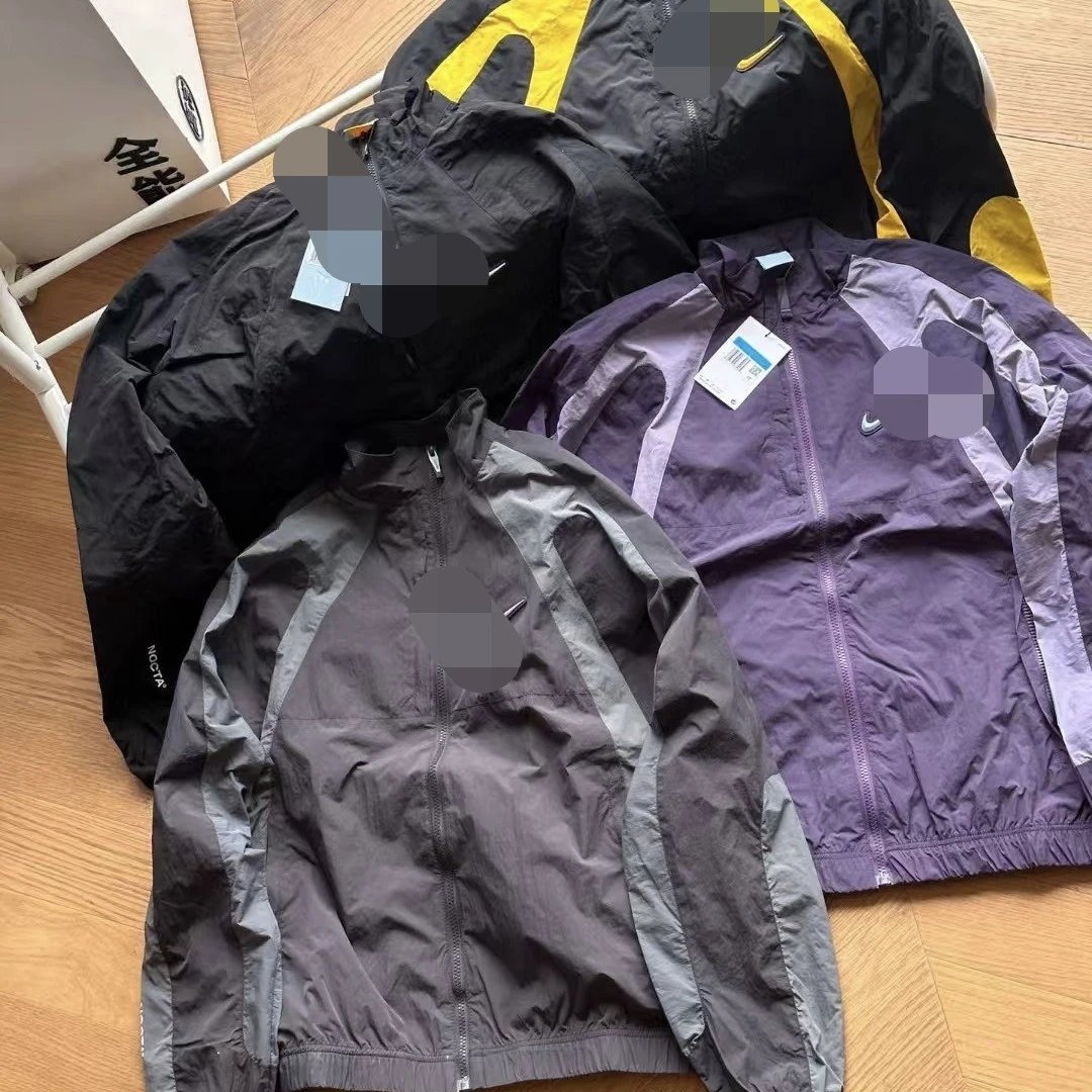 Spring, summer and autumn new noc co-branded hook men's windbreaker jacket color collision splicing stand-up collar men and women couple jacket