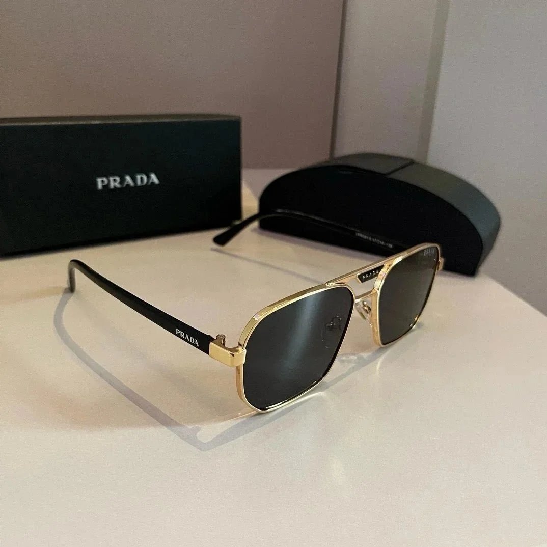 Prada Eyewear Assorted optical and sunglasses frames — 21