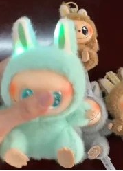 Pop Mart x The Monsters Labubu Have A Seat Series Glowing Teal Plush Keychain Pendant