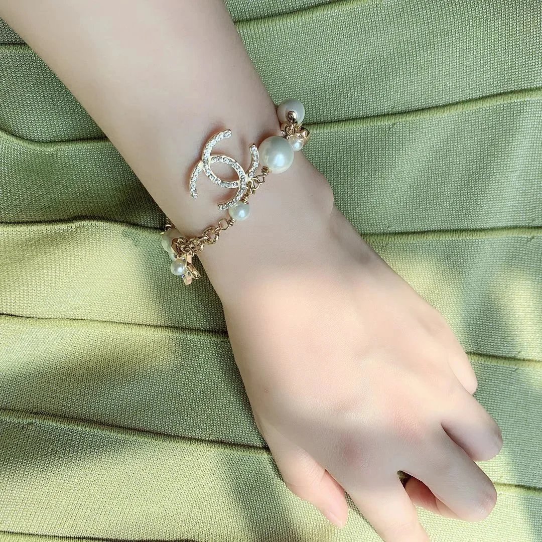 Chanel Gold Pearl Charm Bracel