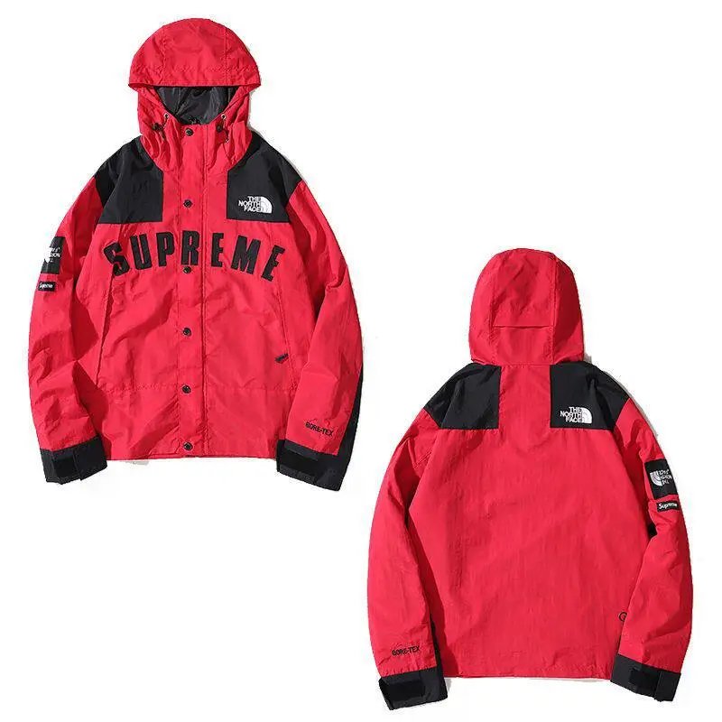 The North Face Jackets Hooded color-block windbreaker jacket — Red