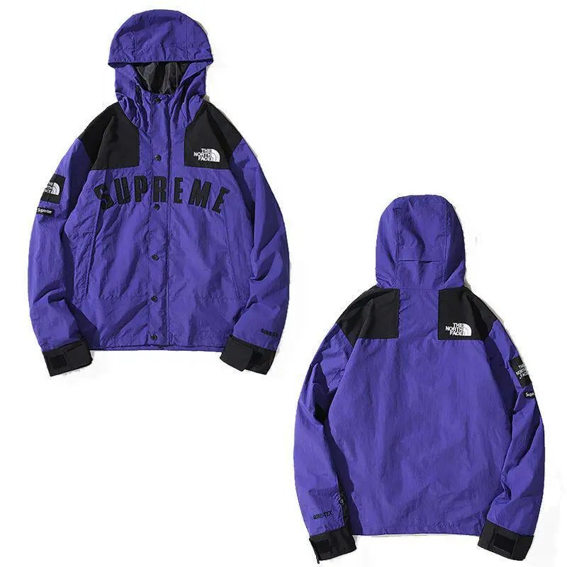 The North Face Jackets Hooded color-block windbreaker jacket — purple