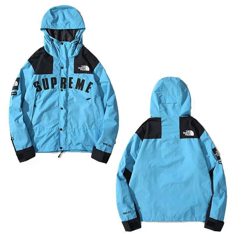 The North Face Jackets Hooded color-block windbreaker jacket — Sky blue