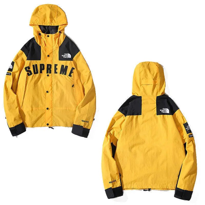 The North Face Jackets Hooded color-block windbreaker jacket — Yellow
