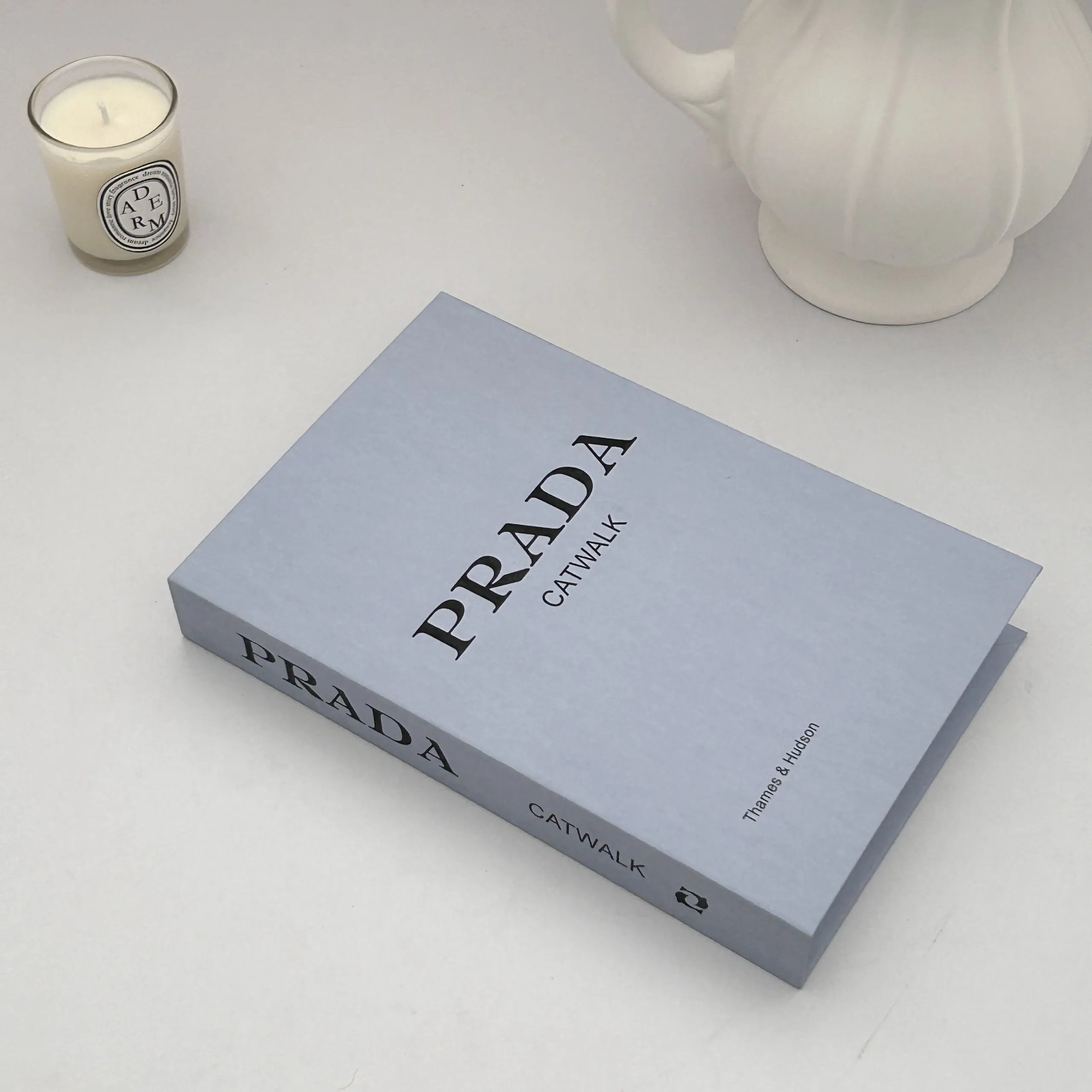 Prada, Tiffany & Co., Dior, Louis Vuitton, Chanel, and Yves Saint Laurent Catwalk Coffee Table Books