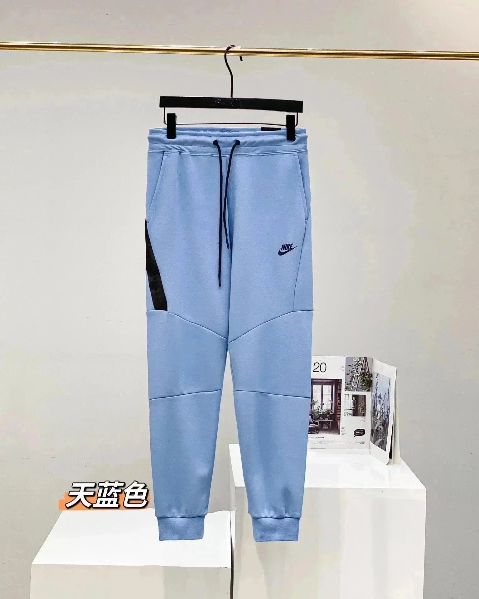 Nike Matching Sets Hooded zip-up jacket and jogger pants set — Blue pants