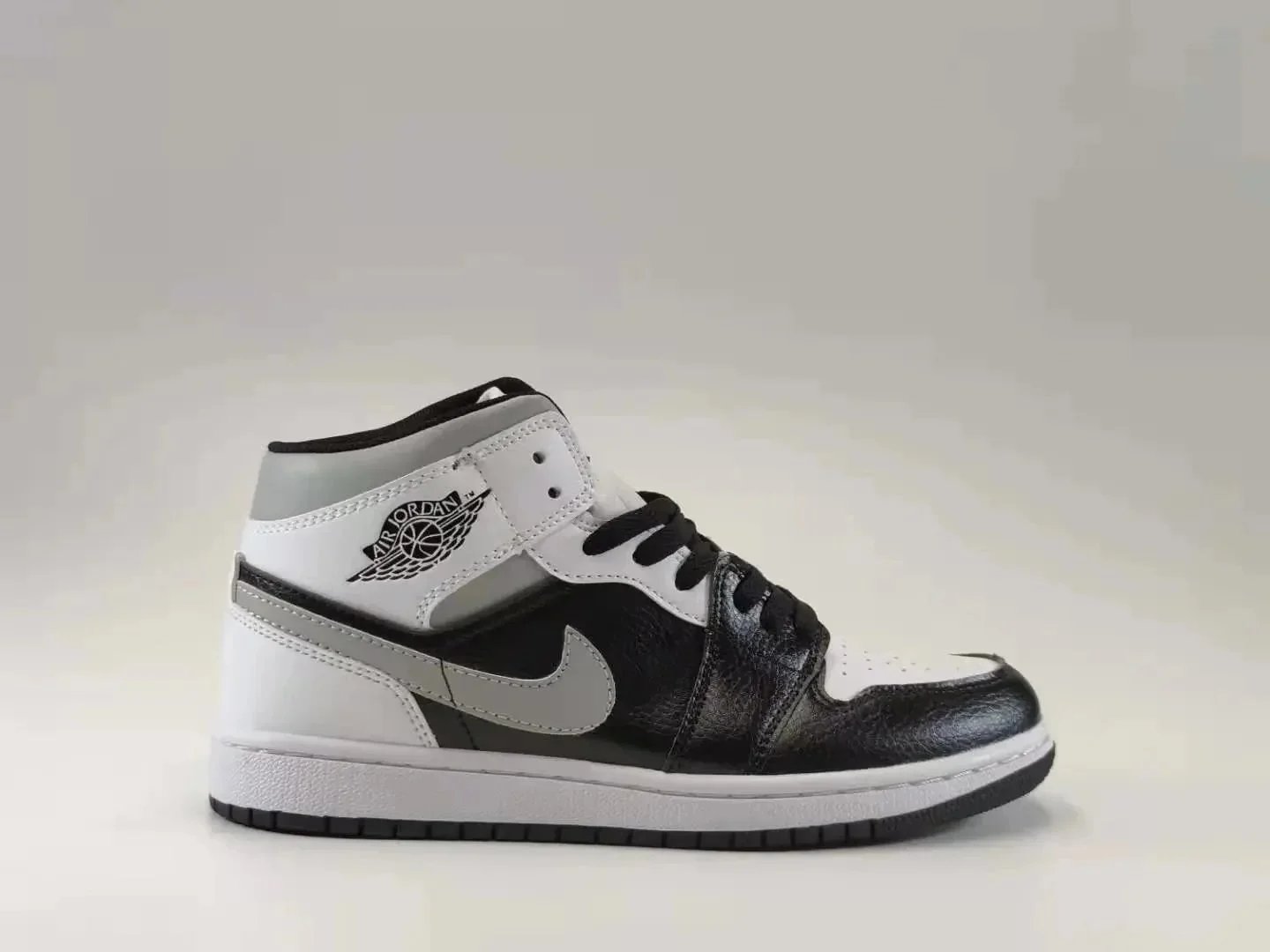 Air Jordan 1 Mid Black/White/Gym Red Sneakers