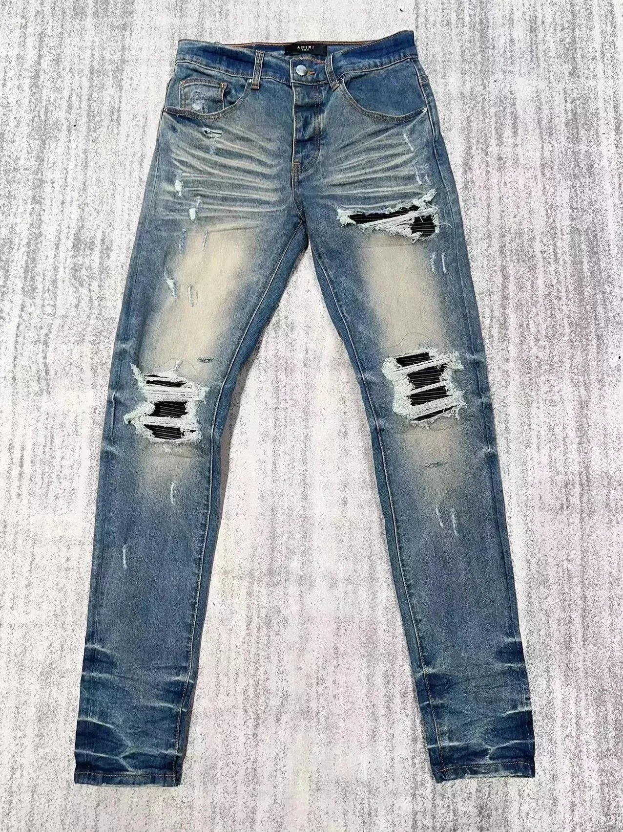 Amiri Distressed printed denim jeans image 13