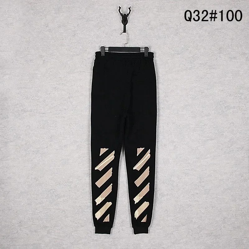 Off-White Trousers Elastic-Waist Jogger Sweatpants with Diagonal Leg Graphics — 7