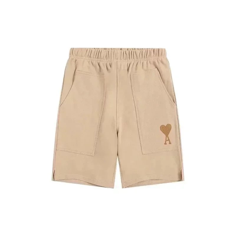 AMI Paris Shorts Drawstring with de Cœur heart patch — Apricot 005