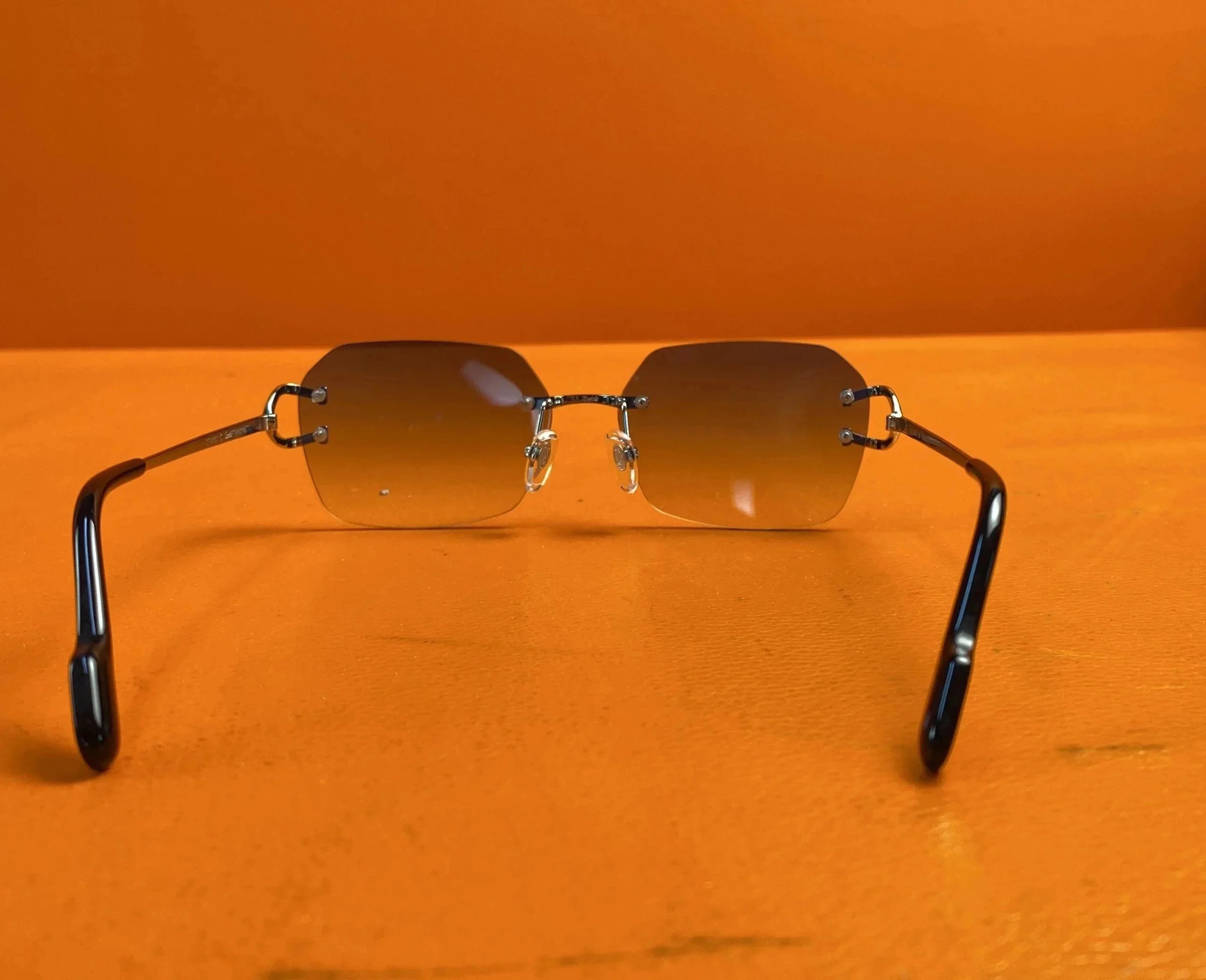 Cartier Eyewear CT0418O Rimless Rectangular Glasses image 2