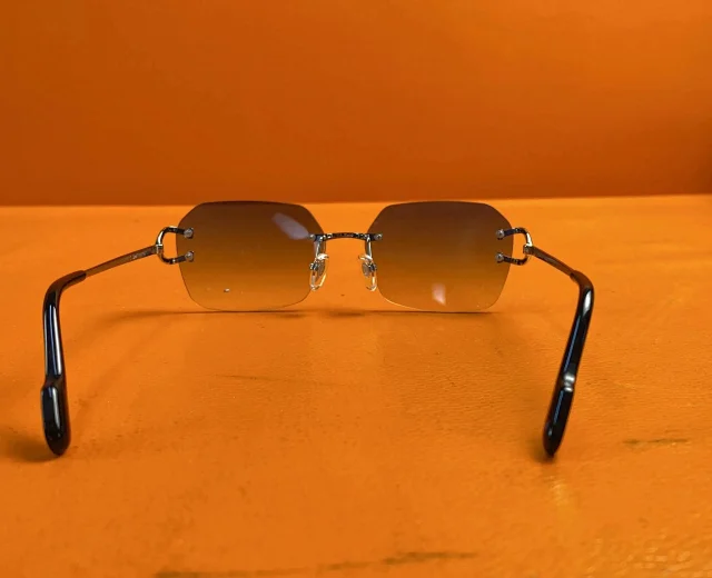 Cartier Eyewear CT0418O Rimless Rectangular Glasses product detail image 2
