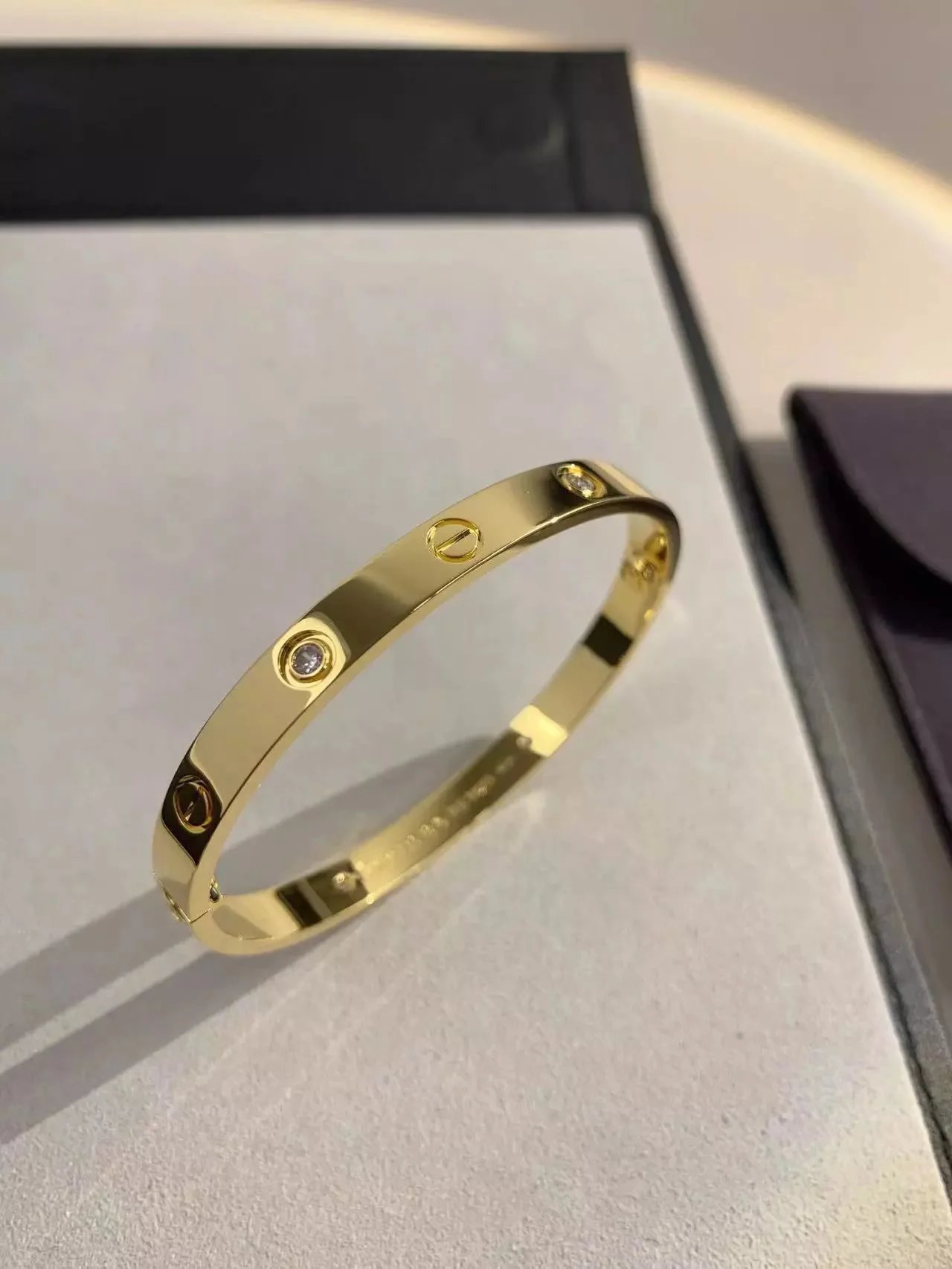 Cartier Jewelry LOVE bracelet with diamond-set screw motifs image 8