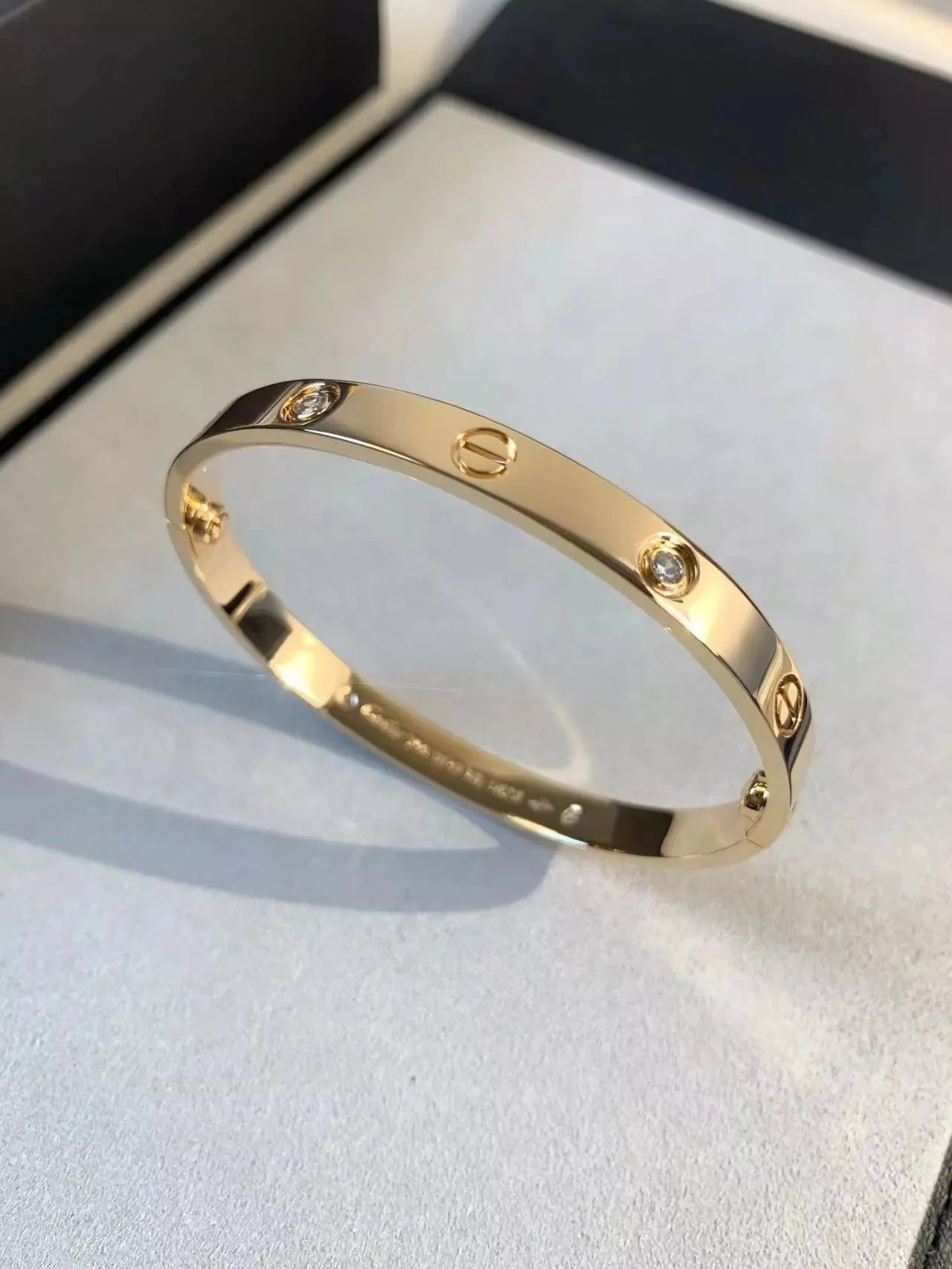 Cartier Jewelry LOVE bracelet with diamond-set screw motifs image 12