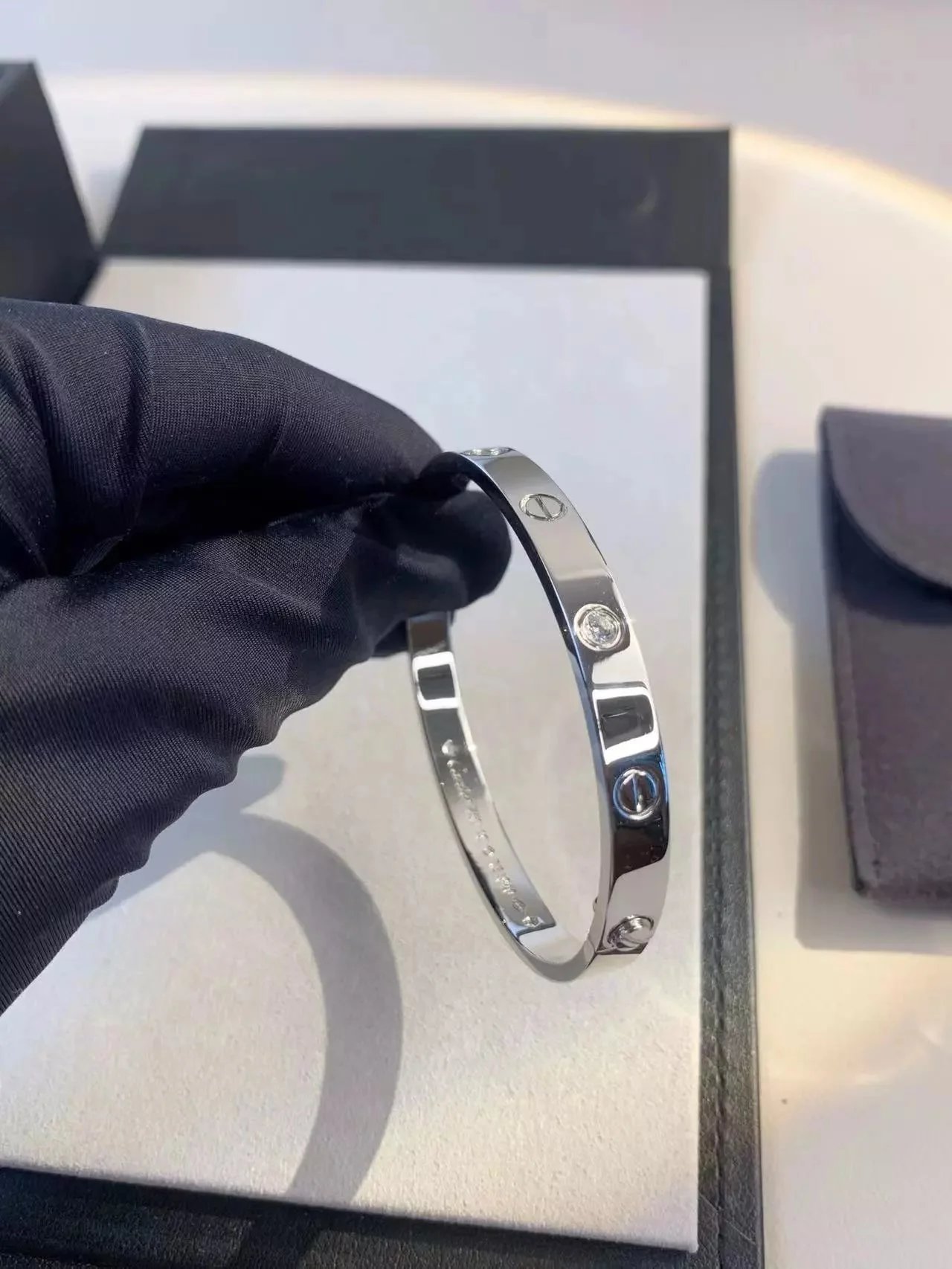Cartier Jewelry LOVE bracelet with diamond-set screw motifs image 11