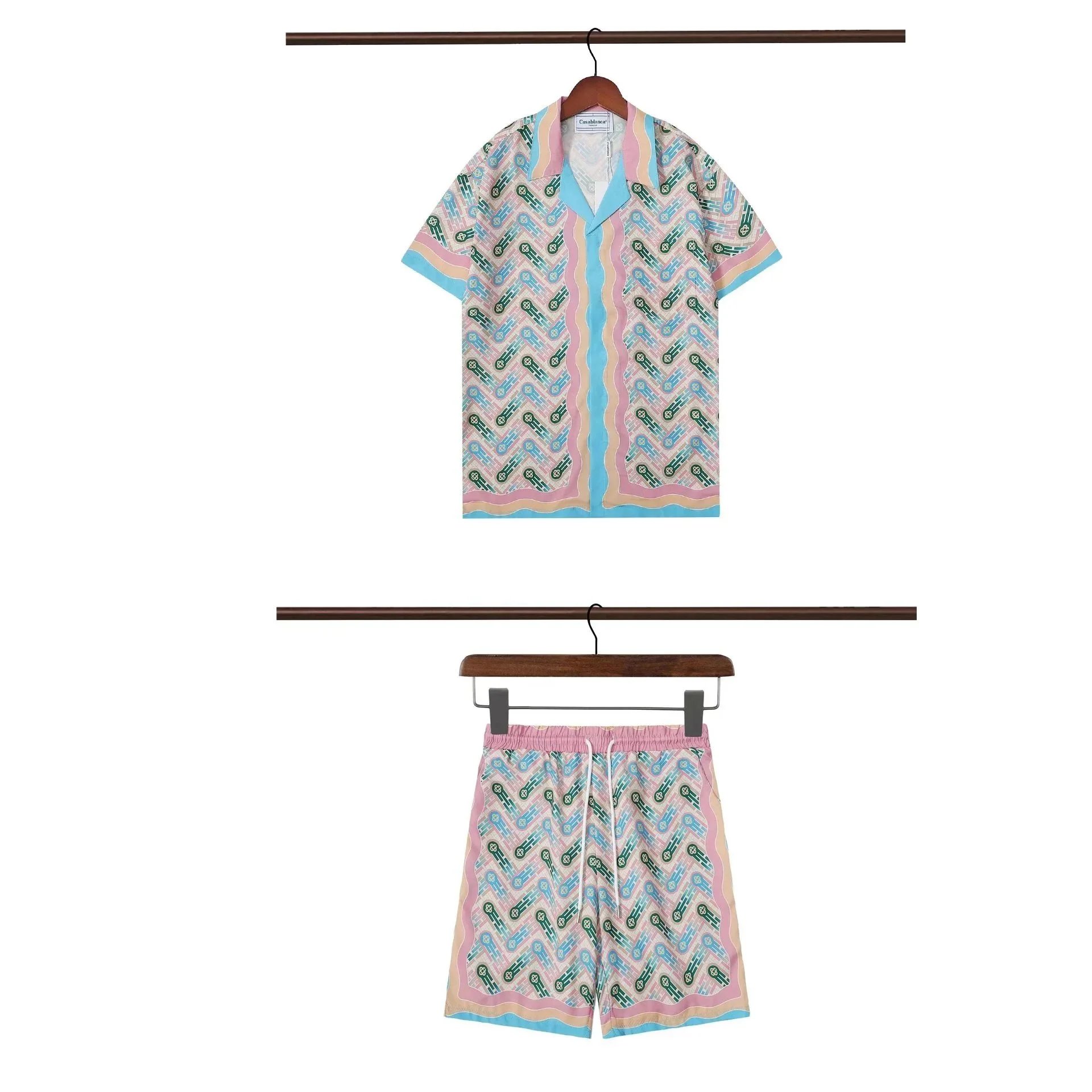 Casablanca Matching Sets Short-sleeve printed shirt and shorts set with wavy trim — 22
