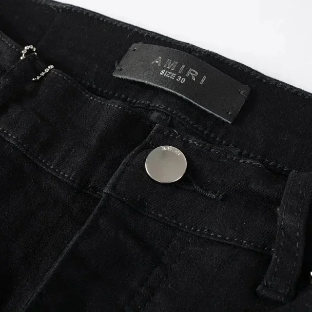 AMIRI Jeans Distressed skinny with logo appliqué product detail image 9