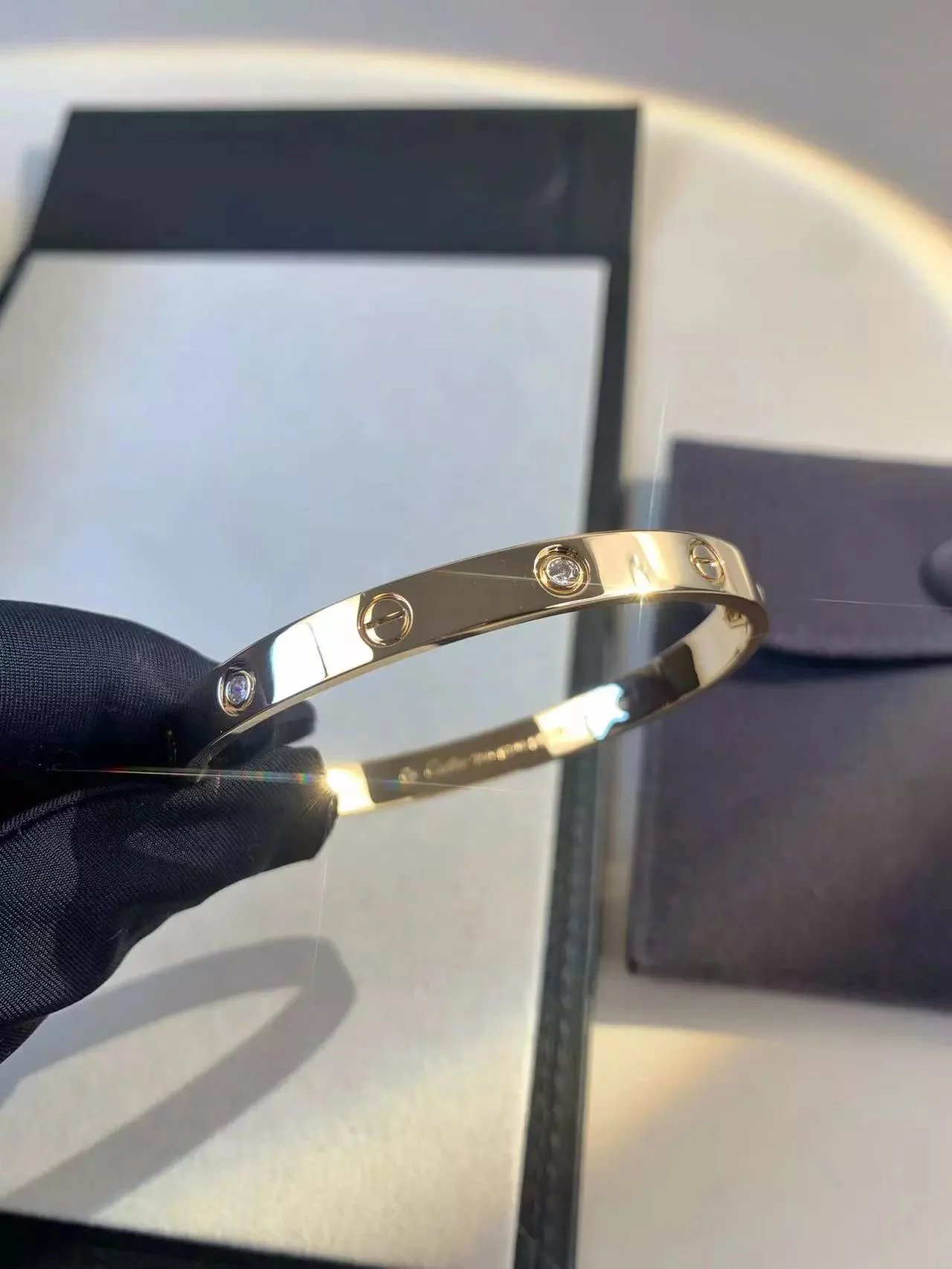 Cartier Jewelry LOVE bracelet with diamond-set screw motifs image 10