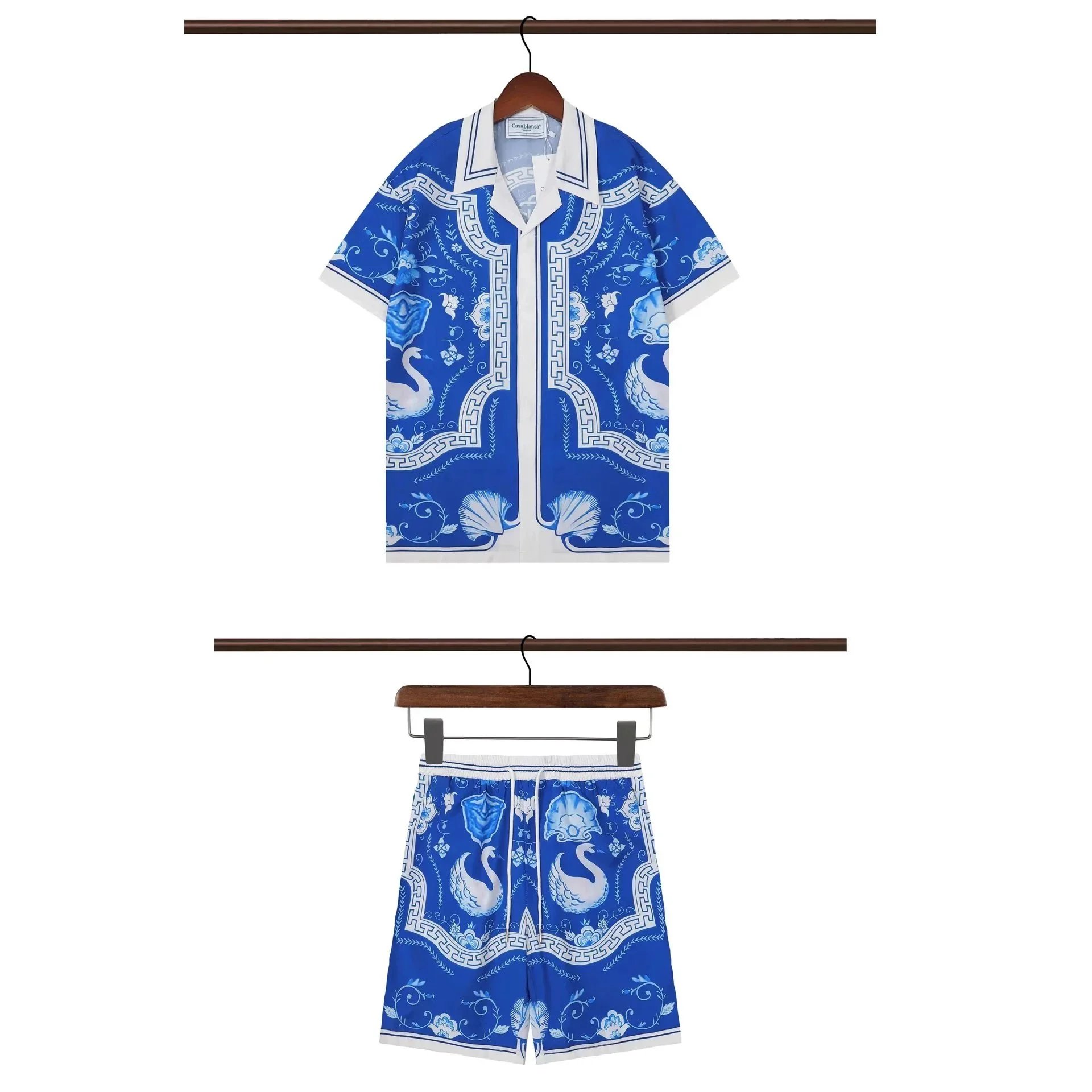Casablanca Matching Sets Short-sleeve printed shirt and shorts set with wavy trim — 16