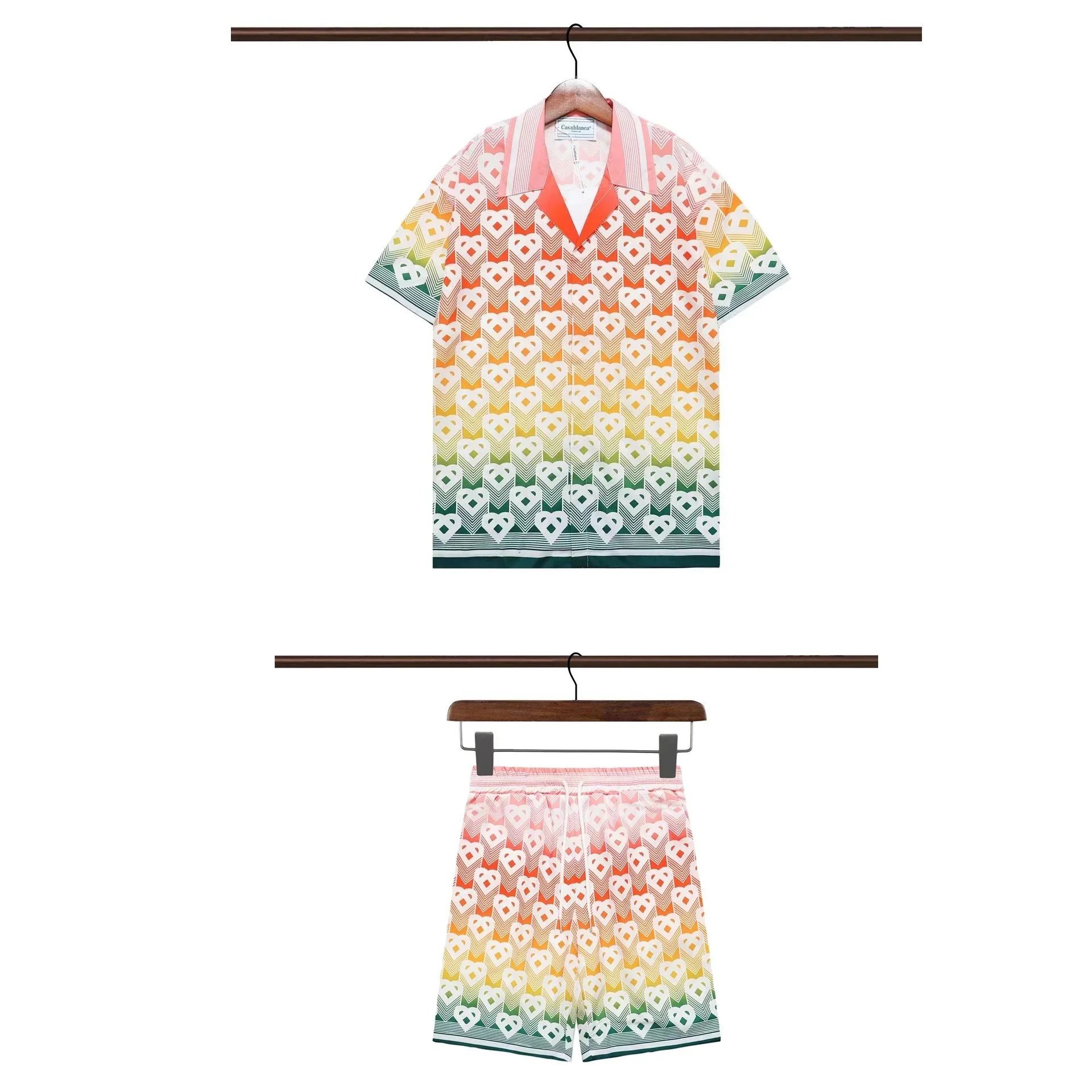 Casablanca Matching Sets Short-sleeve printed shirt and shorts set with wavy trim — 20