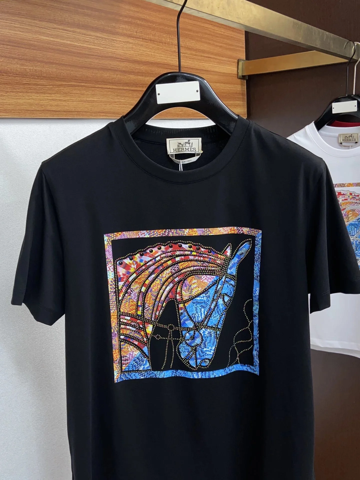 HERMES Black T-Shirt with Colorful Horse Artwork