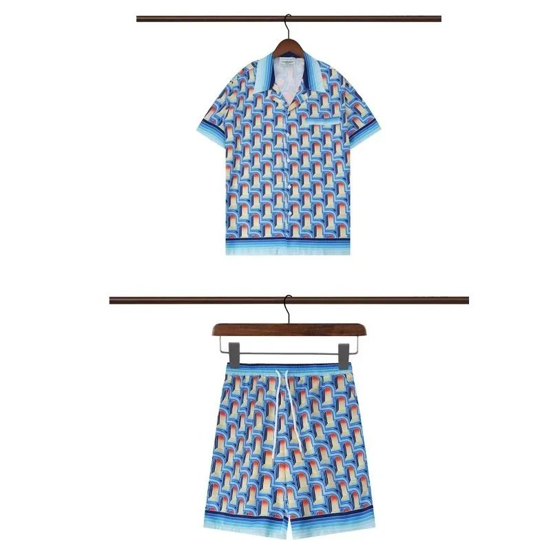 Casablanca Matching Sets Short-sleeve printed shirt and shorts set with wavy trim — 12