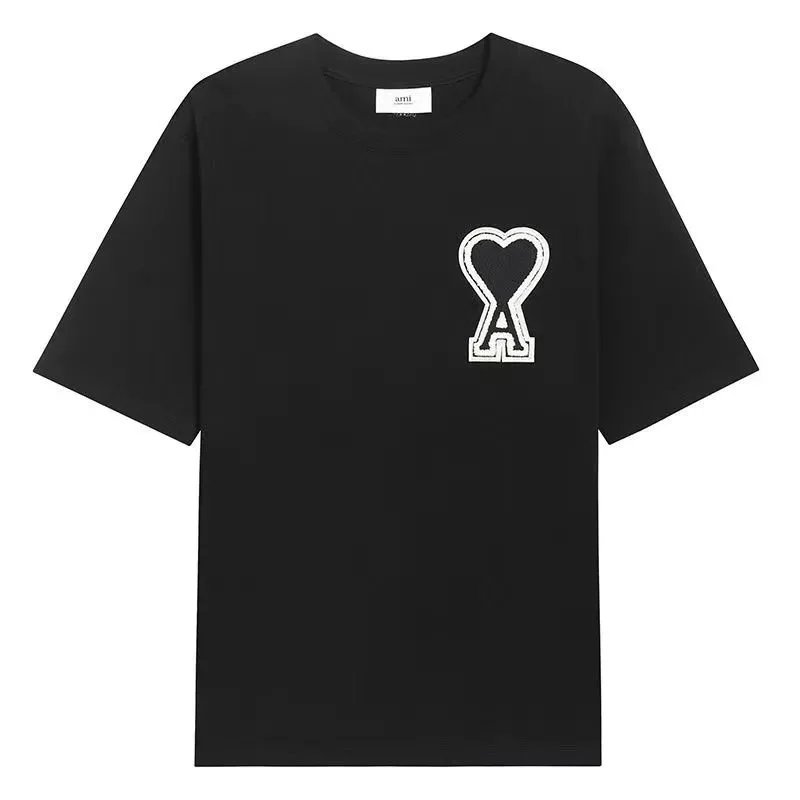AMI Paris T-Shirts Oversized de Coeur logo — 1