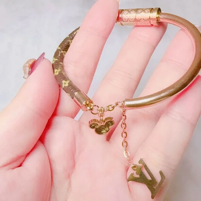 Louis Vuitton Jewelry Monogram Leather and Metal Bracelet with Logo Charm product detail image 4