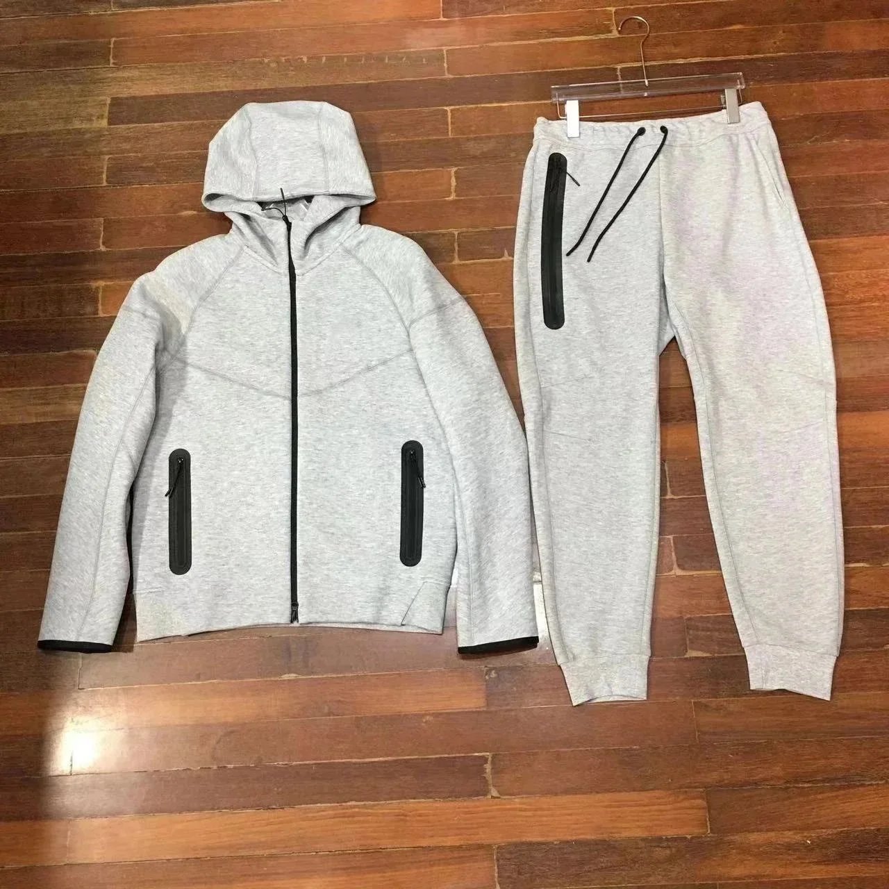 Nike Matching Sets Hooded zip-up jacket and jogger pants set — New gray suit