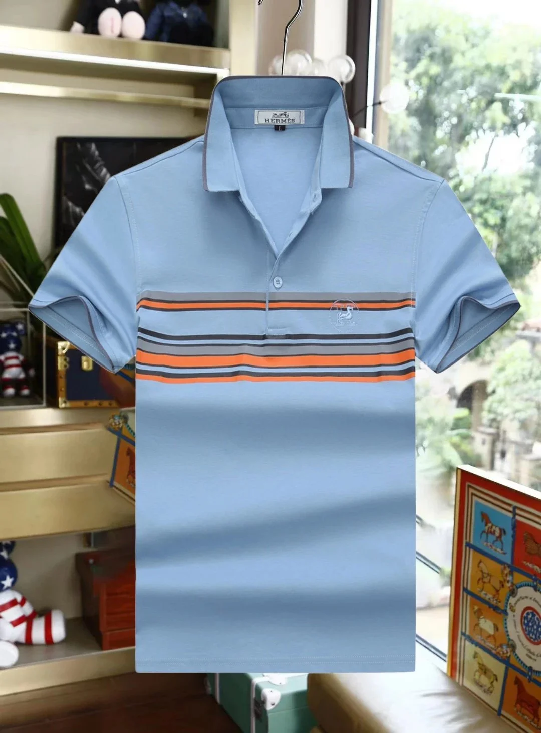 Hermès Men's Light Blue Polo Shirt with Striped De