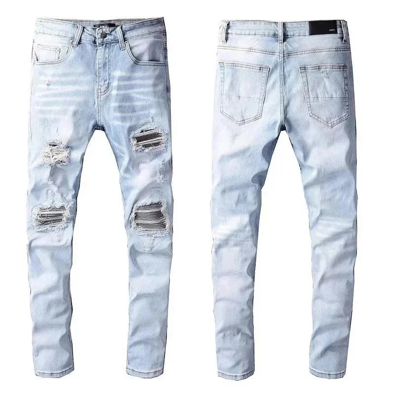 Amiri Distressed printed denim jeans image 10