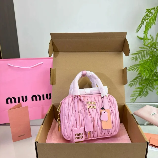 Miu Handbags Logo-Embossed Zip-Top Handbag product detail image 2