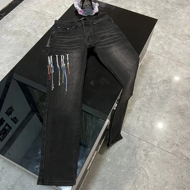 AMIRI Jeans Distressed and embellished denim product detail image 2