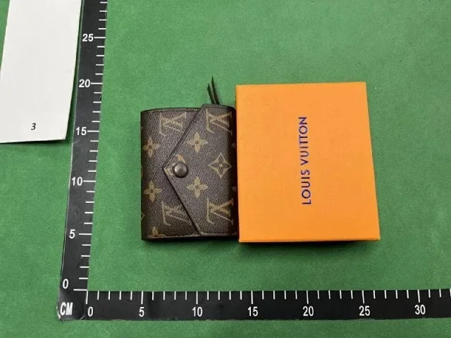 Louis Vuitton Wallets & Card Holders Assorted monogram and textured wallet designs product detail image 9