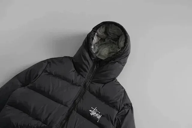 Stüssy Down Jackets Hooded puffer jacket with curved front pockets product detail image 5