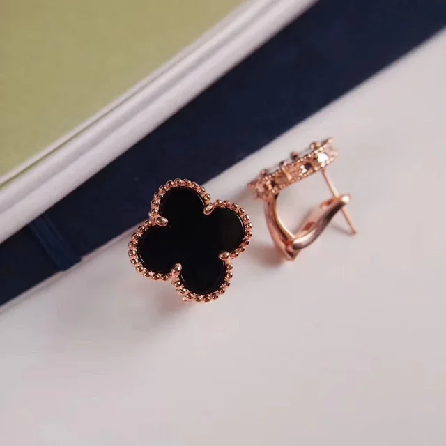 Van Cleef & Arpels Jewelry Pendant Necklaces with Clover, Butterfly and Cube Designs product detail image 10