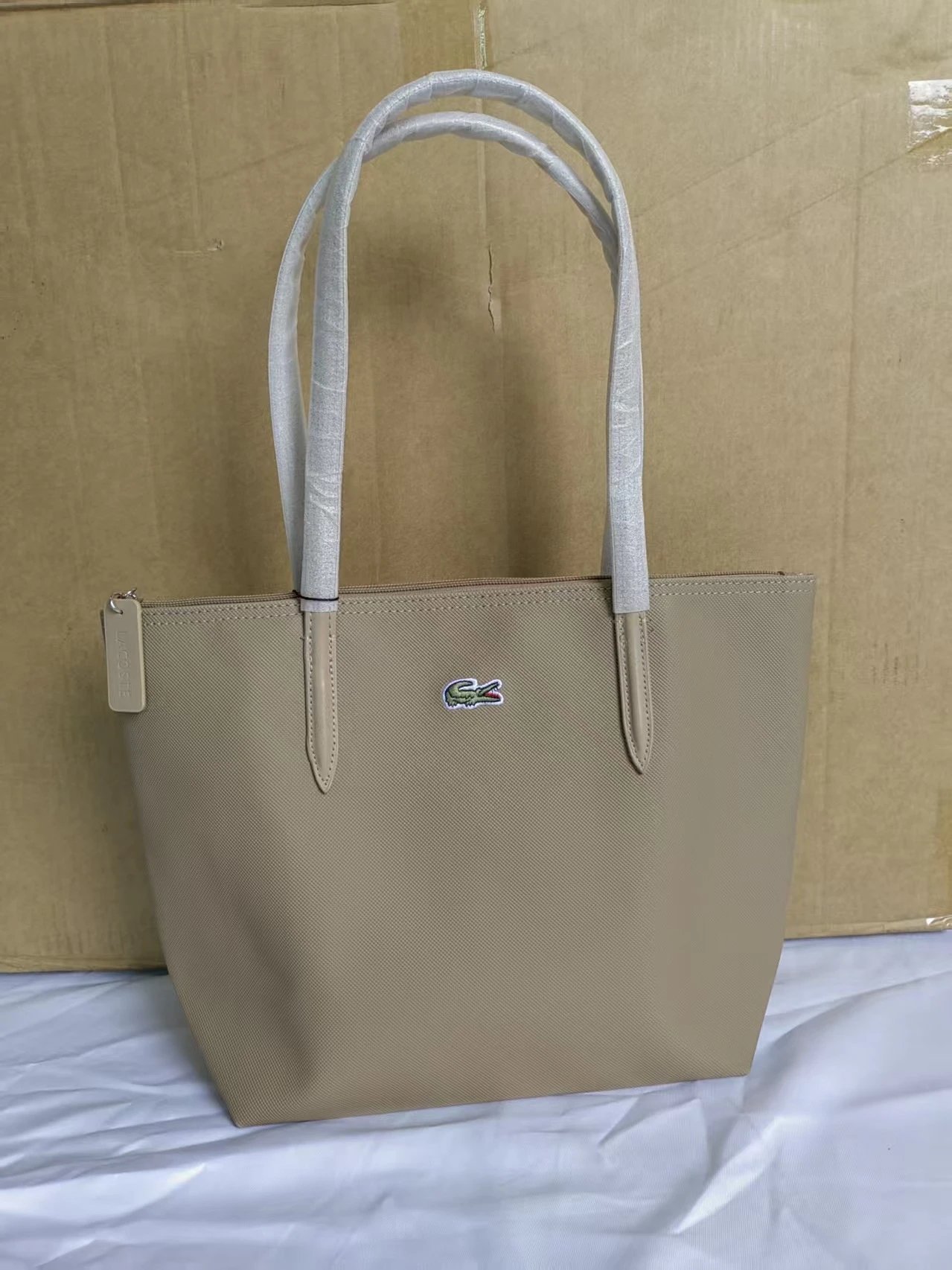 Lacoste Handbags Zip-top tote bag with long shoulder handles — medium khakis